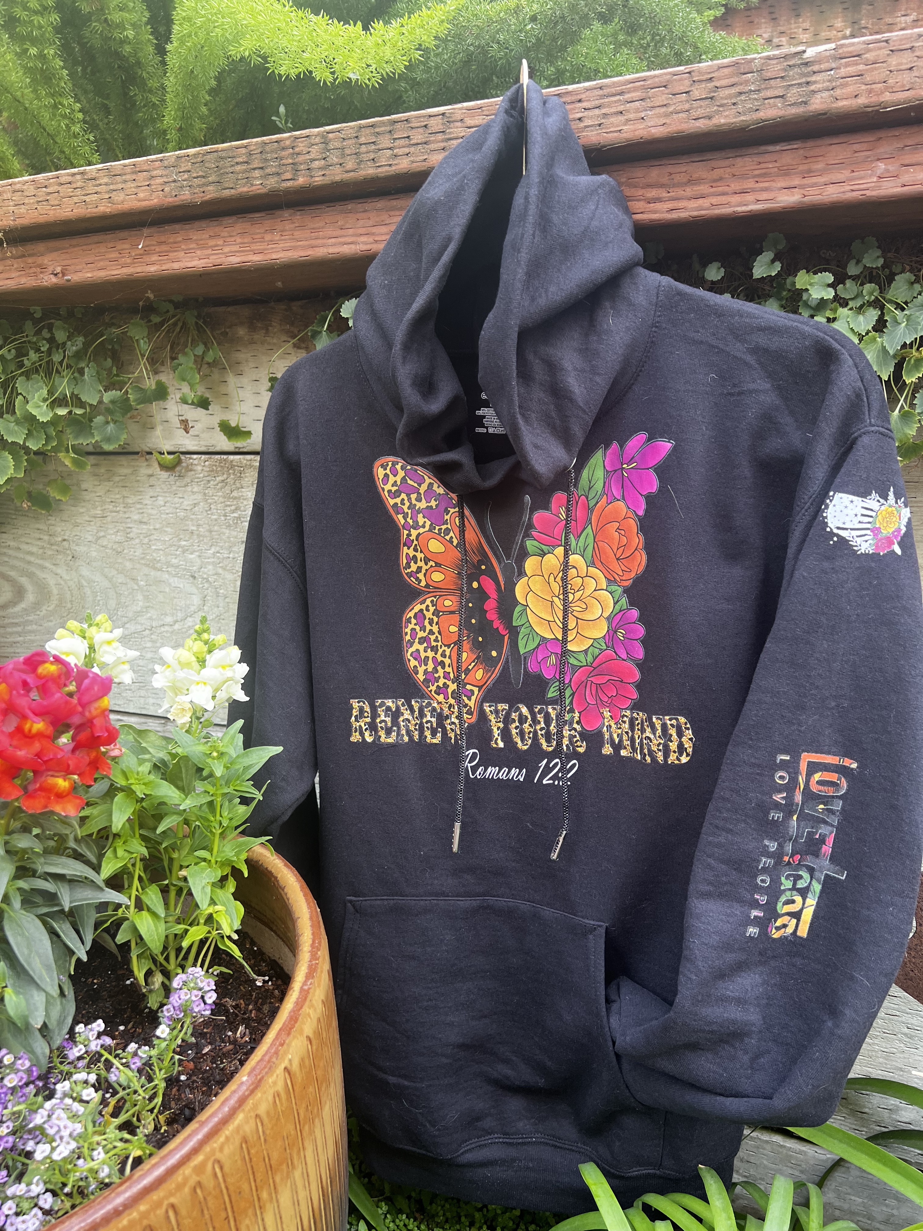 Black hoodie with colorful butterfly and scripture