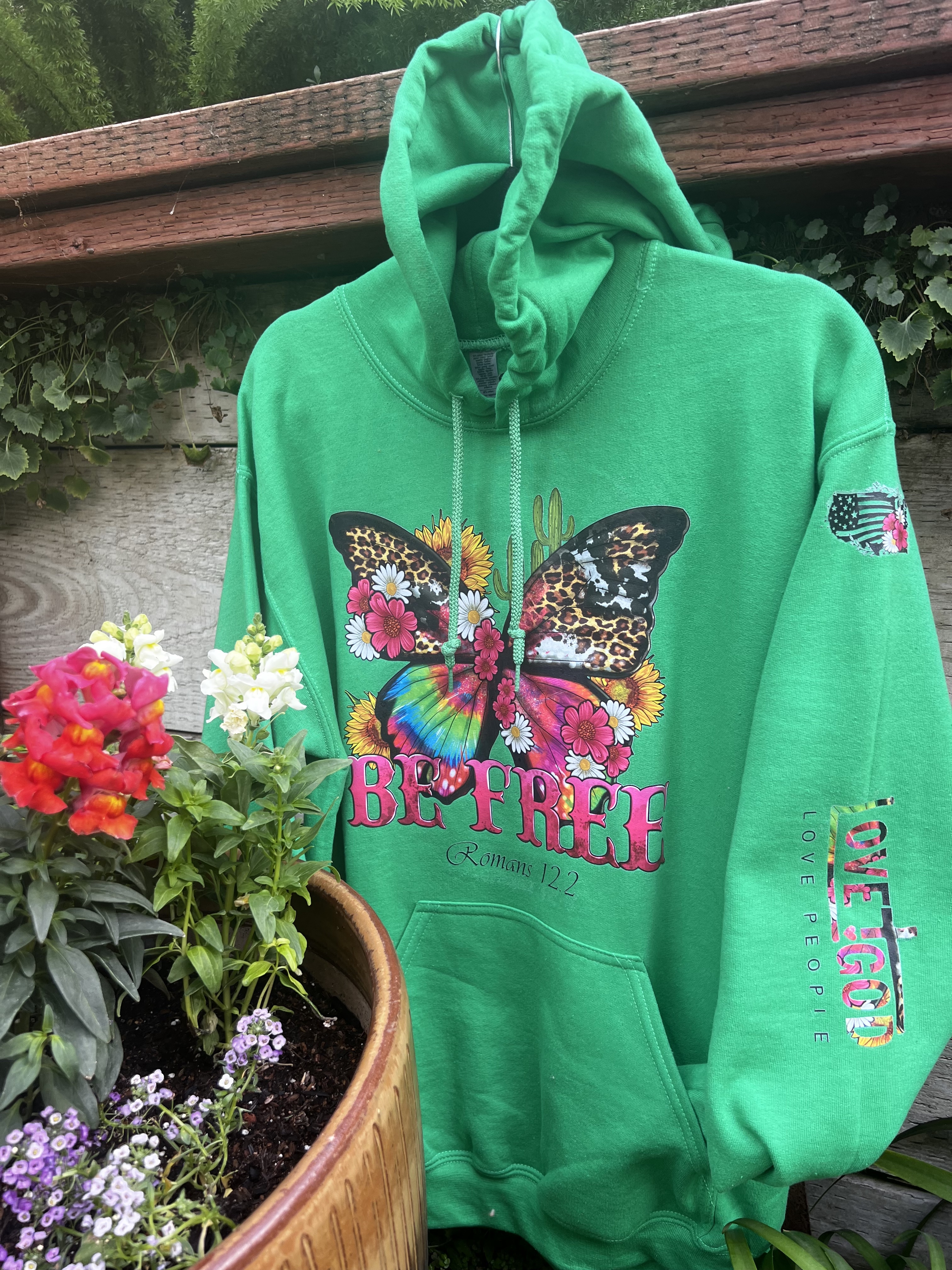 Green hoodie with colorful butterfly and scripture